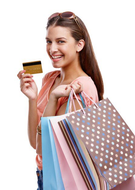 happy woman shopping credit card portrait white background isolated studio product sales rich customer model shopping finance ecommerce